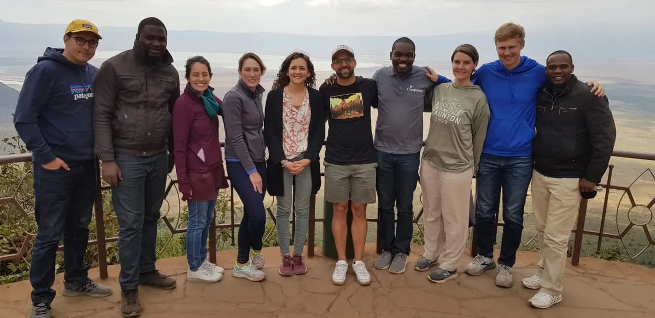 Travellers and their Maguca guides together at the rim of the Ngorongoro Crater.